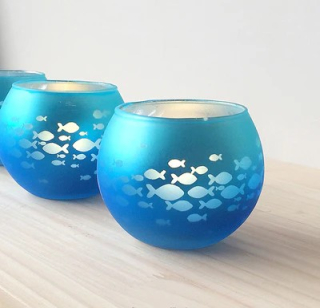 Skleněný svícen se stylovým designem Ichtusfish