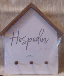 Věšák na klíče ve tvaru domu s biblickým textem.